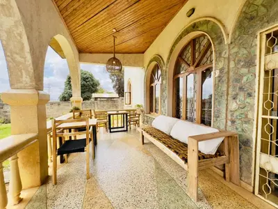 a living room with a couch and a table at Starehe Villa in Arusha