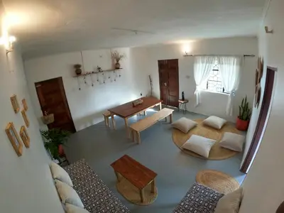 an aerial view of a living room with a table at Nomads nest safari house in Arusha