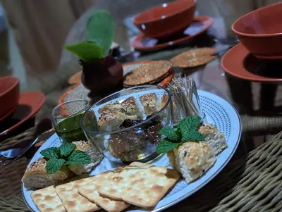 a plate of crackers and crackers on a table at The Lion King Homestay in Moshi