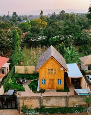an overhead view of a wooden house with a roof at THE WOODEN HOUSE in Msaranga