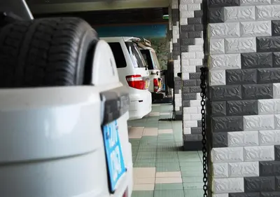 a parking meter with a tire in a parking garage at Mc-Elly's Hotel in Arusha