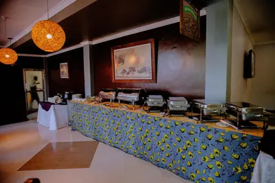 a long table with a bunch of drums on it at Corridor Springs Hotel in Arusha