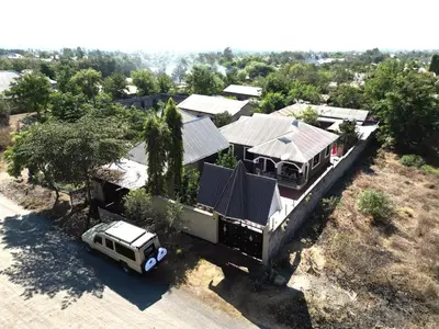 an aerial view of a house with a truck parked in front at Catherine home near kilimanjaro international airport JRO in Moshi