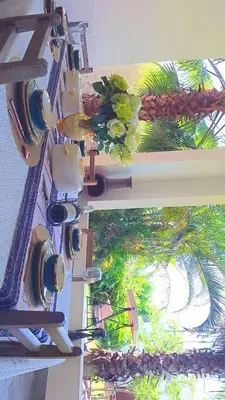 an overhead view of a building with a palm tree at Amala villas in Arusha