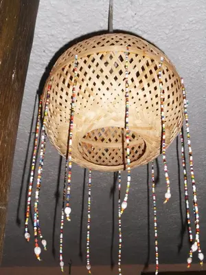a wicker basket with beads hanging from it at Meru Mbega Lodge in Usa River