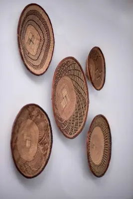 four copper coins on a white background at Diamond Apartments in Arusha