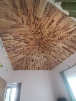 a ceiling that is made out of wood at Unique Heritage in Arusha