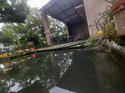 a pool of water in front of a building at Unique Heritage in Arusha