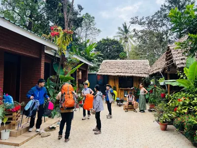 a group of people standing outside of a building at Villa Rosa in Moshi