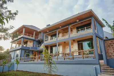 an image of a house with balconies at Samora River Lodge in Arusha