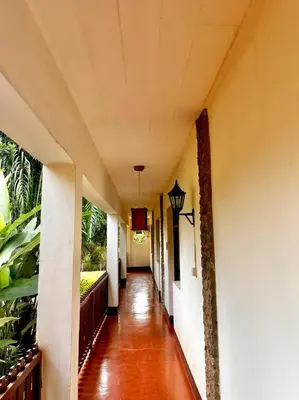 an empty hallway of a house with a hallway at Kilimanjaro Lodge - MCF in Moshi