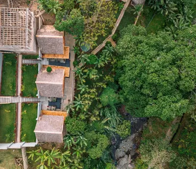 an overhead view of a garden with bushes and trees at Samora River Lodge in Kioga