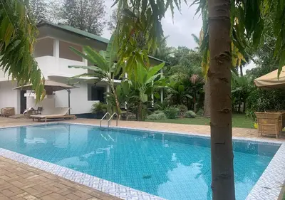 a villa with a swimming pool in a resort at House of West Kili in Bondeni Boloti