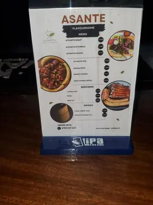 a menu for an asian restaurant on a table at Last fantasy ndoto ya mwisho in Arusha