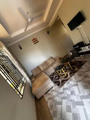 an overhead view of a living room with a couch at chamber 206 in Arusha