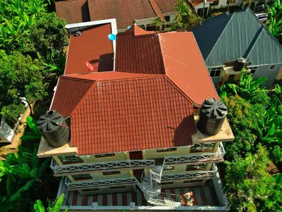 an overhead view of a house with a roof at River House Lodge in Arusha