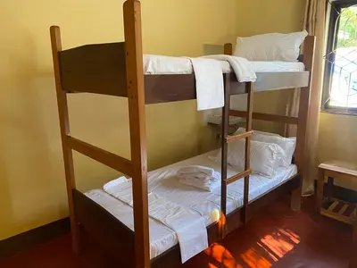 a couple of bunk beds in a room at Tourist Home in Moshi
