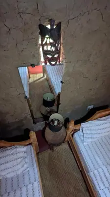 an overhead view of a room with two beds at Alkebulan Farm House in Moshi