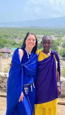 a couple of women standing next to each other at Eagle Nest lake Natron Lodge in Mtowabaga