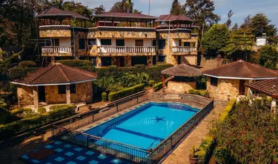 an aerial view of a house with a swimming pool at Gafa House lodge in Sokon