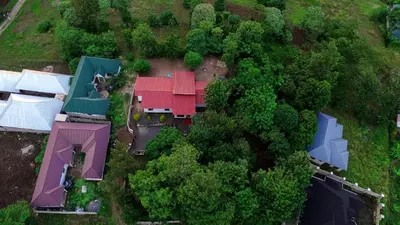an overhead view of a house with red roofs at Eheruro Homestay in Arusha