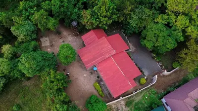 an overhead view of a house with a red roof at Eheruro Homestay in Arusha
