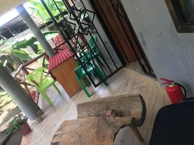 an overhead view of a room with chairs and a table at Humphrey home stay in Arusha