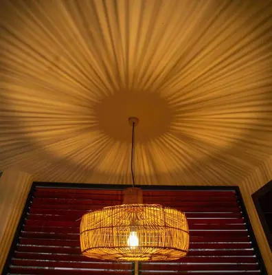 a chandelier hanging from a ceiling in a room at The Green House in Arusha