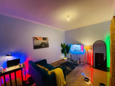 a living room with a couch and a tv at gustavo in Sokon