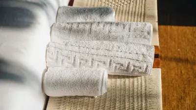 three rolls of toilet paper sitting on a table at Mateves boutique lodge in Arusha