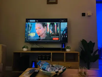 a flat screen tv sitting on top of a table at The Dawn cottage in Moshi