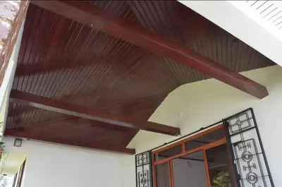 a wooden ceiling in a house at Barazani Garden House in Moshi