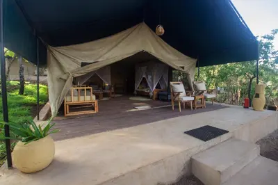 a large tent with chairs and tables in it at Africa Safari Manyara Escarpment in Mto wa Mbu
