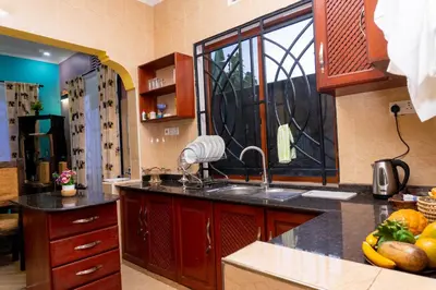 a kitchen with a sink and a window at Rosemo villa in Nduruma Chini