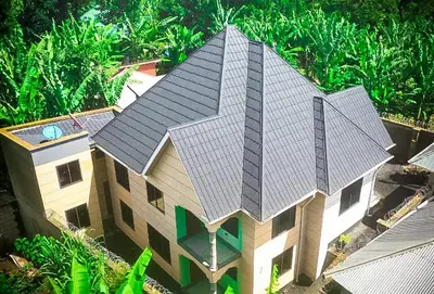an aerial view of a house with a roof at The Hill Villas House in Arusha