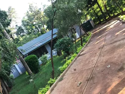 an overhead view of a house with a wooden deck at Kitonga Escape in Msaranga