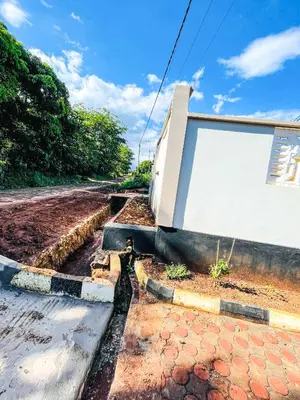 a road with a building on the side of it at Havijo Residence