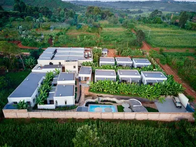 an aerial view of a house with a pool at Pamoja Farm Villas in Karatu
