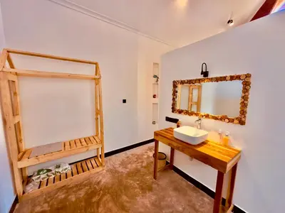 a bathroom with a sink and a mirror at Nalala in Arusha
