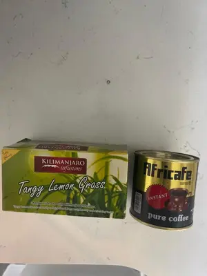 a can of tewaylean grease and a can of tuna at Mount Meru Baraka House