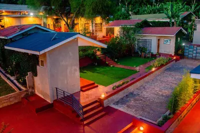 an aerial view of a house with a yard at Babylon Lodge in Marangu