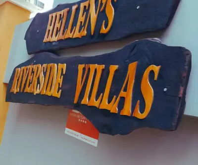 two bags of cheese milks sitting on a table at Hellens Riverside Villa Luxury Garden Room in Msaranga