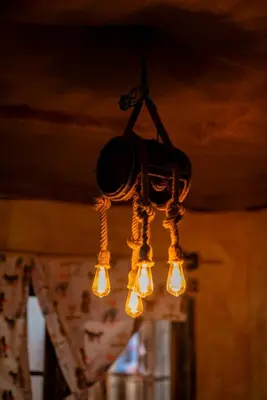 a chandelier hanging from a ceiling in a room at Langalanga Eco Farm in Nkoanrua
