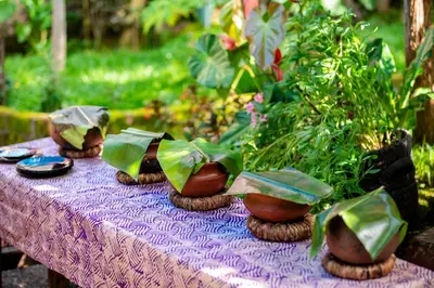 a table with a purple table cloth with shoes on it at Langalanga Eco Farm in Nkoanrua