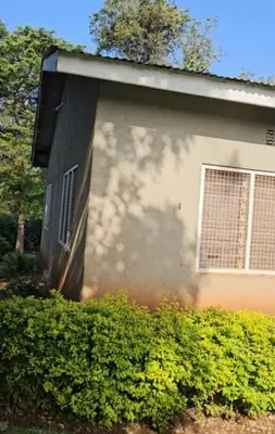 a building with a window on the side of it at West Kilimantis in Bondeni Boloti