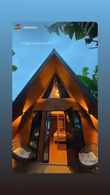 a picture of a house with a roof at A-Frame tiny house in Arusha