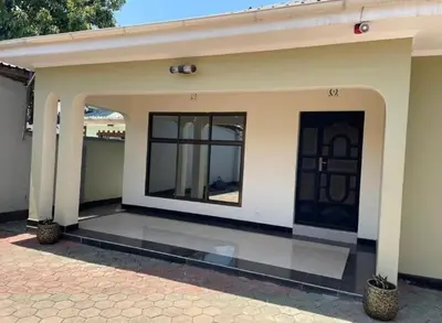 a detached house with a entrance to a house at Emmalanta Homes in Arusha