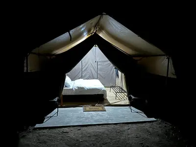 a view of a tent with a bed in it at Namayana Camp in Makama