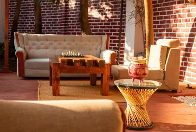 a living room with a couch and a table at Ukarimu Hosts in Arusha