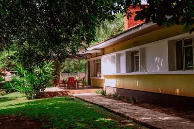 a house with a porch and a patio at Avana Home in Arusha